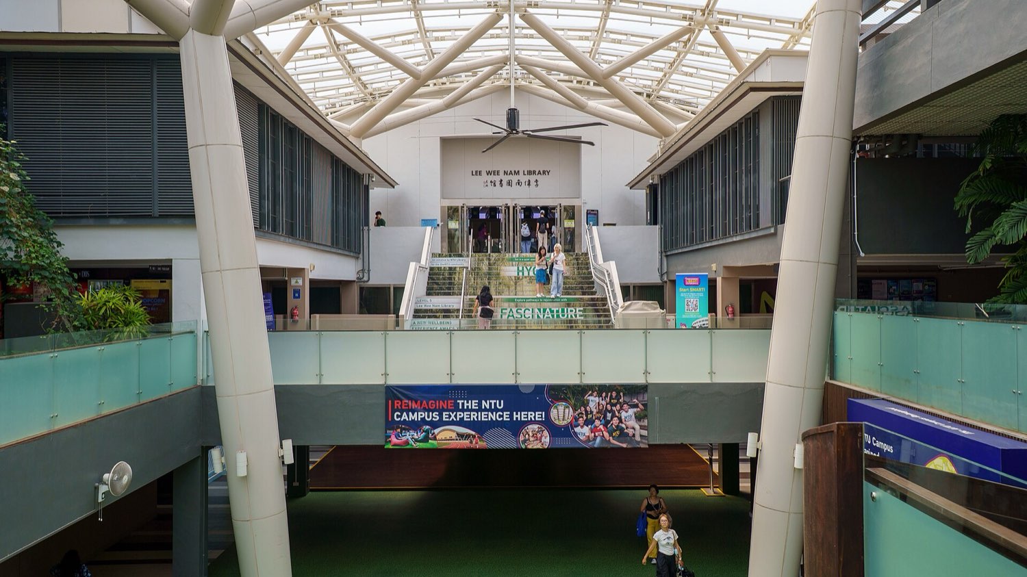 The North Spine atrium at NTU, with the entrance to Lee Wee Nam Library up the stairs
